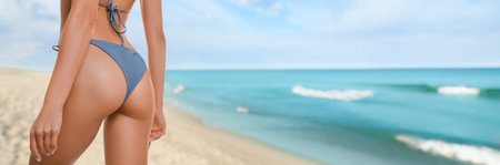 Attractive woman in swimsuit on beautiful tropical beach, closeup. Banner design