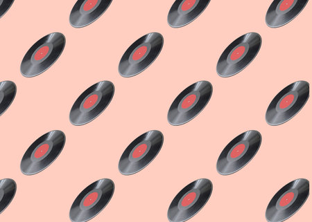 Pattern of vinyl records on pink beige background