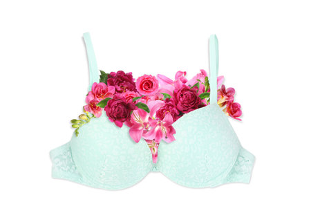 Beautiful bra with pink flowers on white background, top viewの写真素材