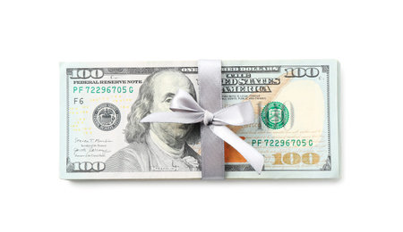 Money bonus. Dollar banknotes with bow isolated on white, top view