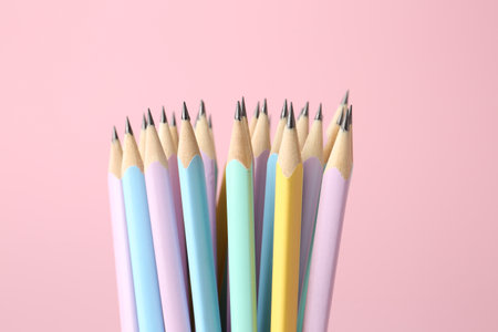 Many graphite pencils on pink background, closeupの写真素材