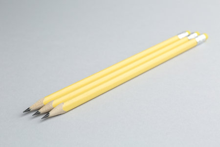 Many graphite pencils on light grey background, closeupの写真素材