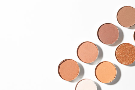 Beautiful eyeshadow refill pans on white background, flat lay. Space for textの写真素材