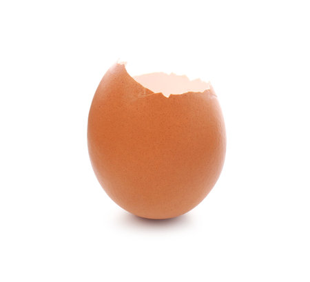 Piece of cracked eggshell isolated on white