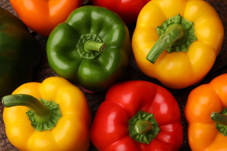 Fresh colorful bell peppers on table, flat layの写真素材