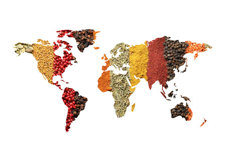 World map made of different aromatic spices on white backgroundの写真素材