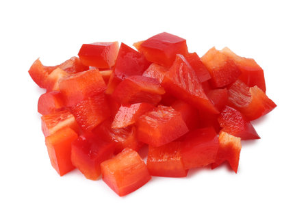 Pieces of fresh red bell peppers isolated on whiteの写真素材