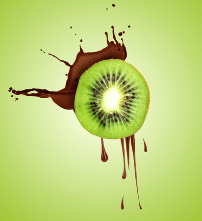 Chocolate splash with juicy kiwi in air on green backgroundの写真素材