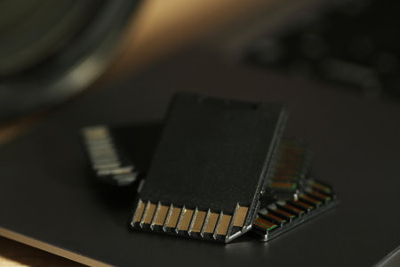 SD memory cards on laptop, closeup viewの写真素材