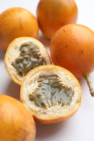Ripe passion fruits on white background, closeupの写真素材