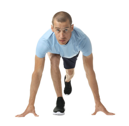 Runner in starting position on white background