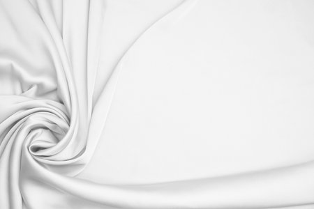 Texture of white silk fabric as background, top viewの写真素材