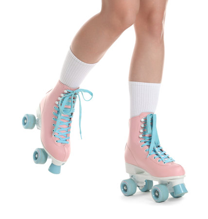 Woman in roller skates on white background, closeup