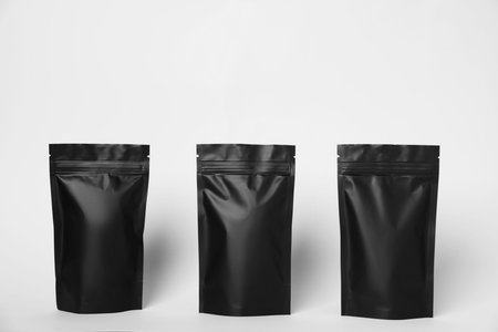 Zipper stand-up pouches on white background. Mockup for design