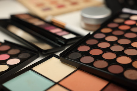 Different makeup products on dressing table indoors, closeupの写真素材