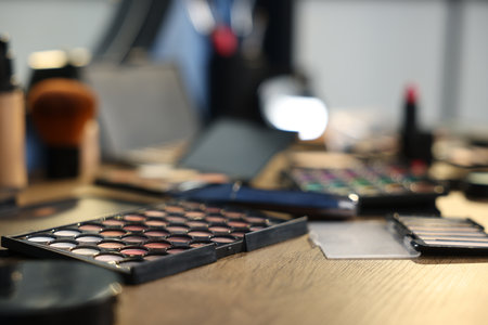 Different makeup products on wooden table indoors, closeupの写真素材