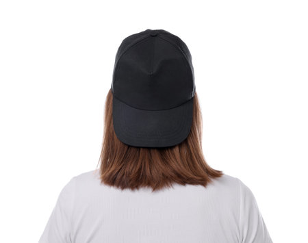 Young woman wearing stylish black baseball hat on white background, back viewの写真素材