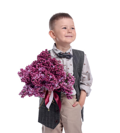 Little boy with bouquet of lilac flowers on white backgroundの写真素材