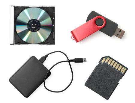 Different modern memory drives isolated on white, collage. Top view