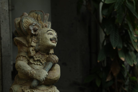 Bali, Indonesia - May 15, 2025: Beautiful ancient sculpture outdoors, space for text