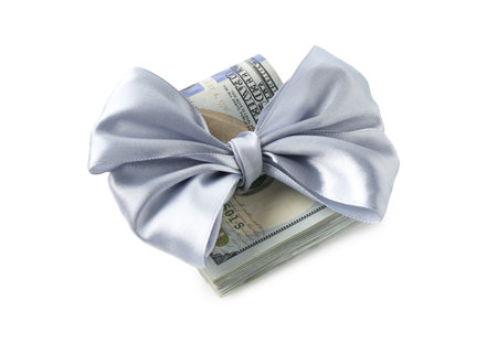 Money bonus. Dollar banknotes with bow isolated on whiteの写真素材