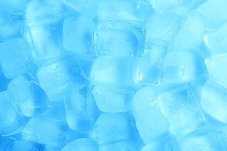 Cubes of clear ice as background, top view