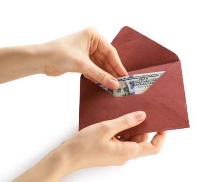 Money bonus. Woman holding envelope with dollar banknotes on white background, closeupの写真素材