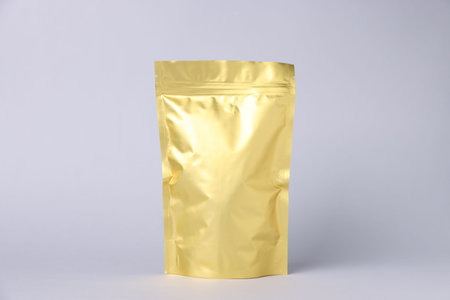 One zipper stand-up pouch on light gray background. Mockup for design