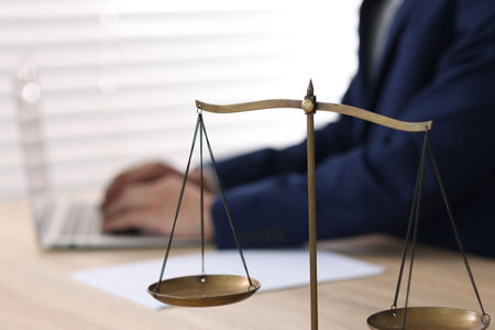 Judge working and scales on desk indoors, selective focusのeditorial素材