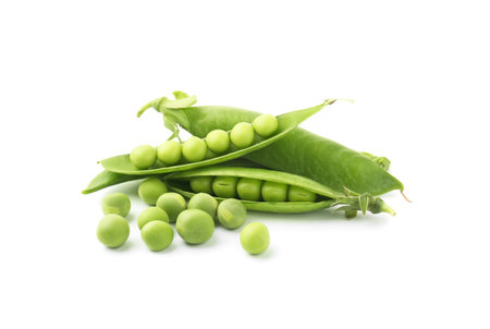Fresh green peas in pods isolated on whiteの写真素材