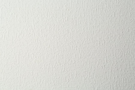 White textured surface as background, closeup view