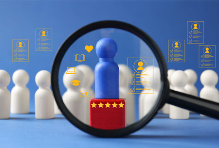 Employee search. Blue pawn among white ones, view through magnifying glass