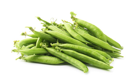 Pile of fresh green pea pods isolated on whiteの写真素材