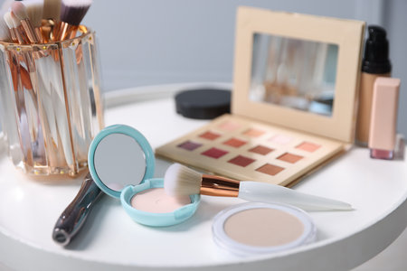 Different makeup products on white table indoors, closeupの写真素材