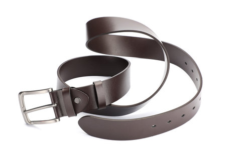 One brown leather belt isolated on whiteの写真素材
