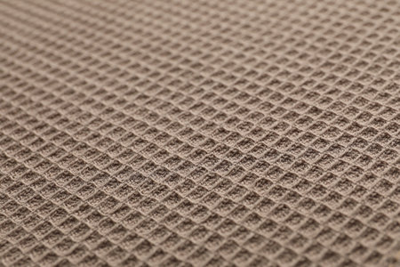Clean brown waffle towel as background, closeupの写真素材