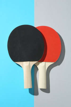 Ping pong rackets on color background, top viewの写真素材