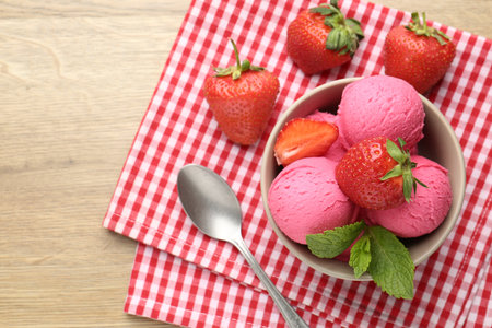 Refreshing sorbet, strawberries and mint on wooden table, top viewの写真素材