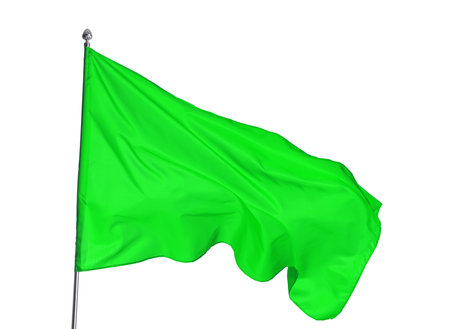 One green flag on white background. Mockup for designの写真素材