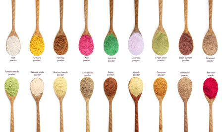 Superfoods. Different powders in spoons and names on white background, set. Top viewの写真素材