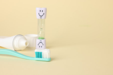 Different oral care products on beige background, closeup. Space for textの写真素材