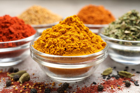 Different aromatic spices on light grey table, closeupの写真素材
