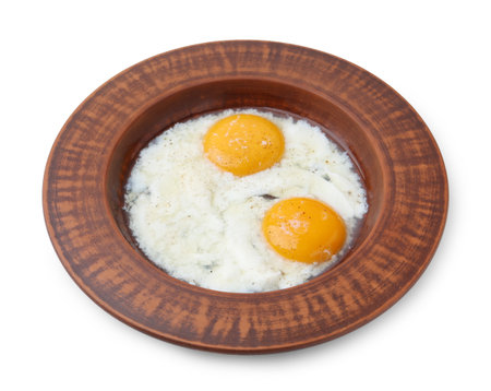 Half-boiled eggs in plate isolated on white. Traditional asian breakfastの写真素材