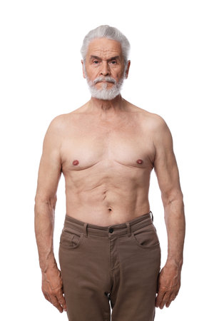 Portrait of confident senior man on white backgroundの写真素材