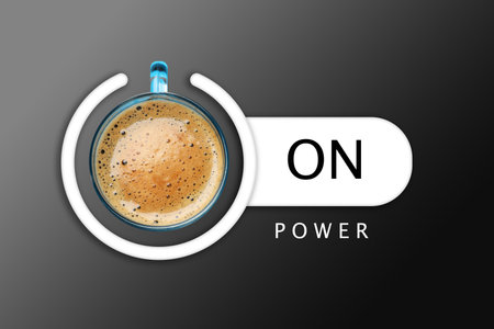 Power On phrase and standby symbol with cup of coffee on black background, top viewの写真素材