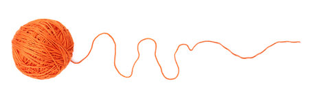Ball of bright orange knitting yarn on white background, top viewの写真素材