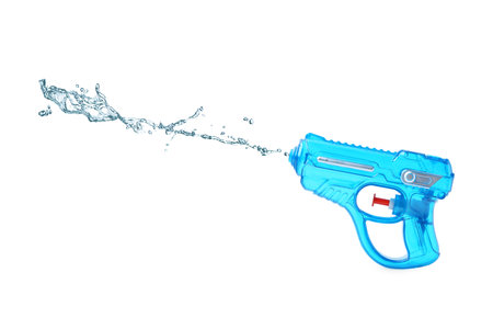 Water gun with jet on white backgroundの写真素材