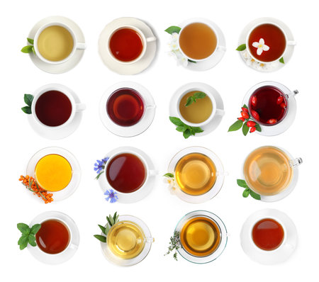 Different types of tea in cups isolated on white, set. Top viewの写真素材