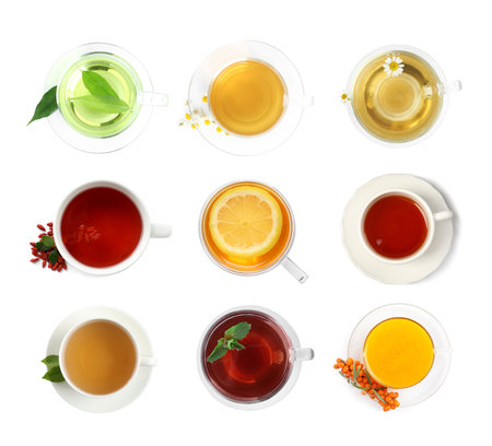 Different types of tea in cups isolated on white, set. Top viewの写真素材