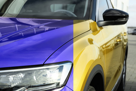 Modern blue auto before and yellow after painting, closeup. Comparative collage of car repaintの写真素材